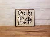 Ready aim fire ." 6X6 wooden sign