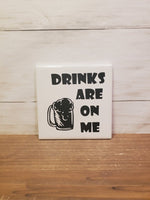 Sq Ceramic Coaster -Drinks Are On Me