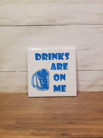 Sq Ceramic Coaster -Drinks Are On Me